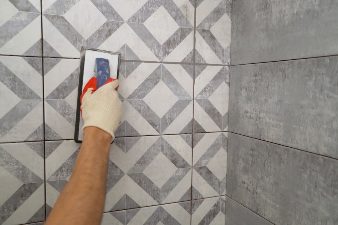 Grout color sealing in shower
