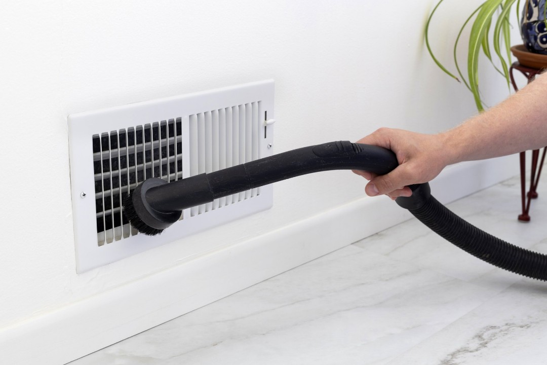Vacuuming indoor air vents