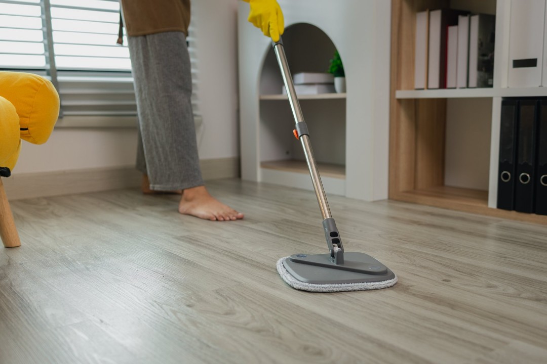 Cleaning luxury vinyl plank flooring in a home
